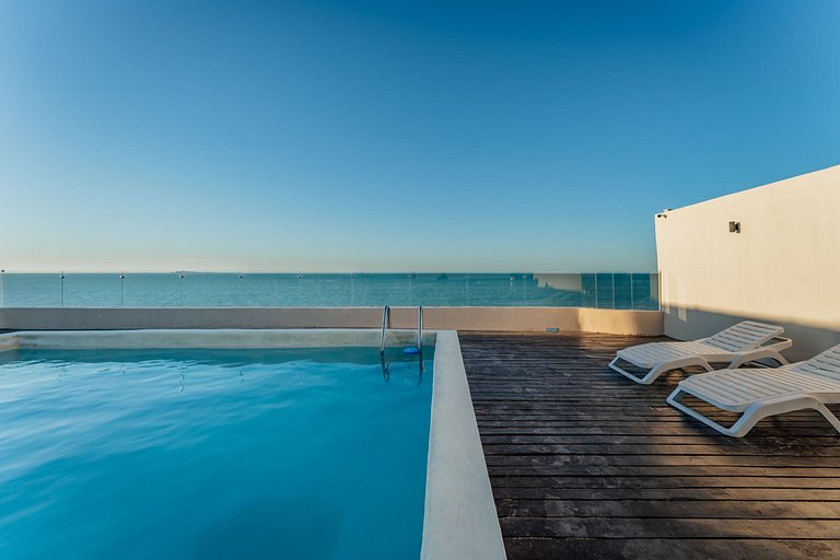 Condo vista al mar, alberca rooftop Chixchulub